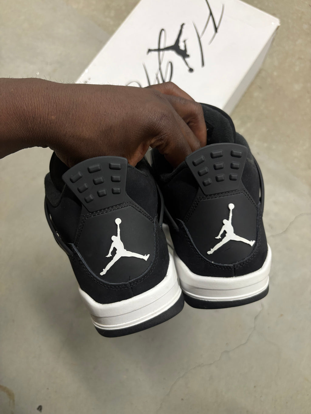 Size 6y - Jordan 4 Retro White Thunder